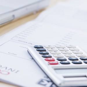 financial papers and a calculator