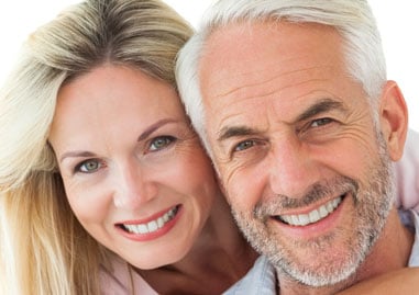 Man and woman smiling
