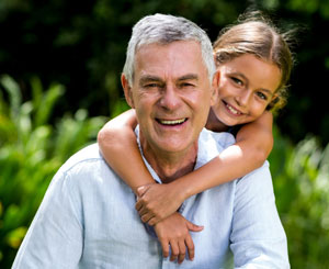 Man with child hugging him